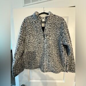 Fuzzy sweater, with pockets. Size XL from Walmart.